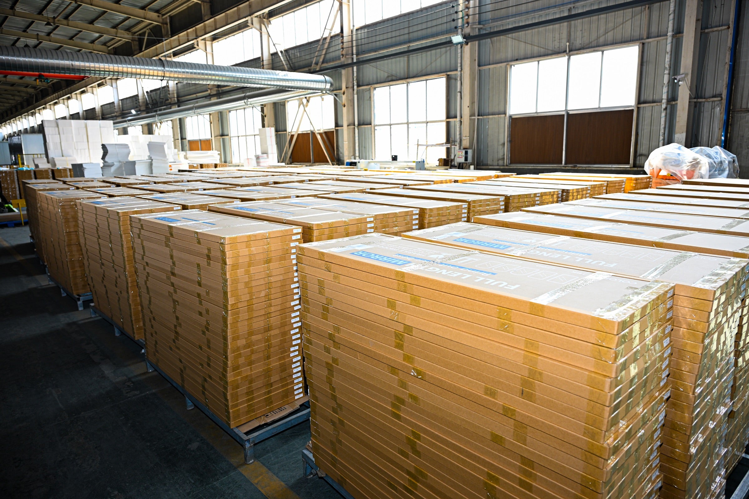 Packaged mirror inventory ready for project and bulk order support